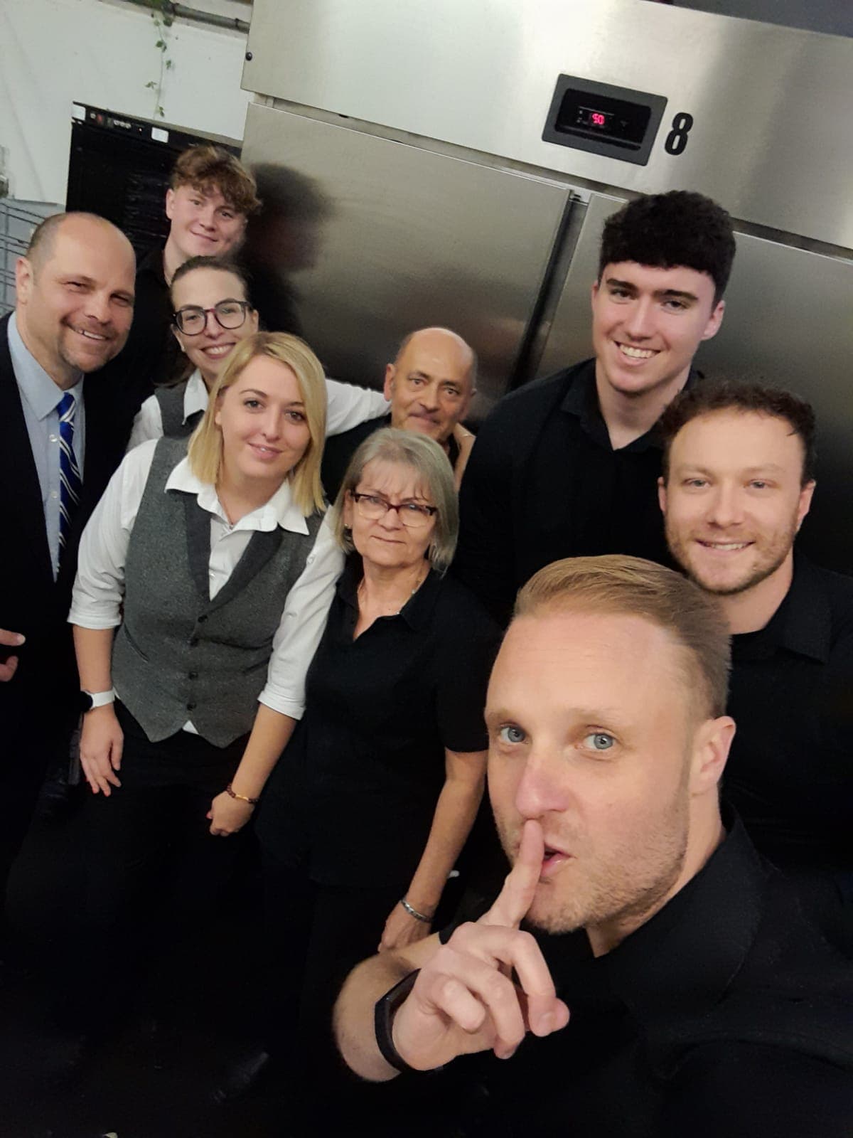 Surprise singing waiters with the waiting on team before the event starts