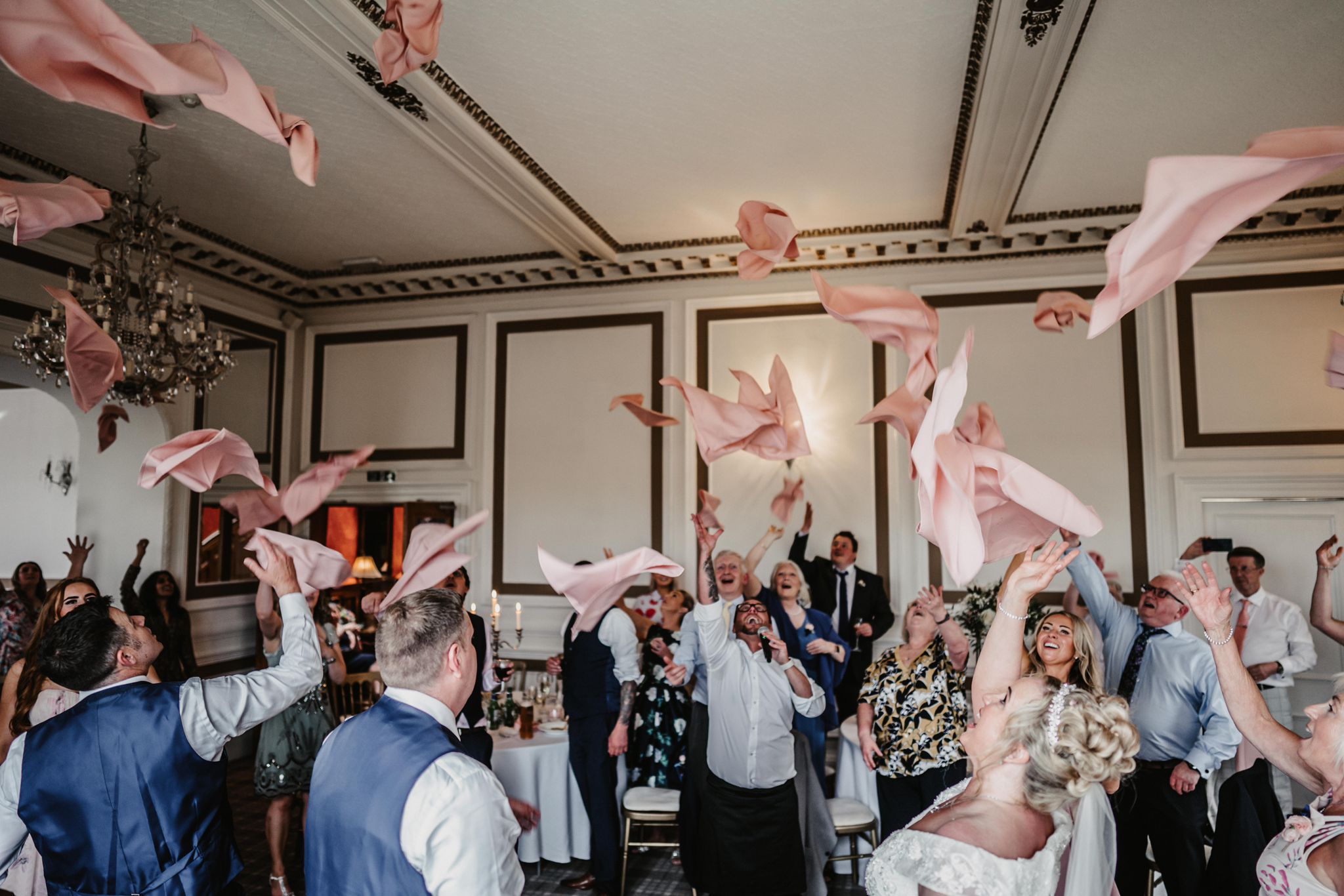 Silver Service singers throwing napkins