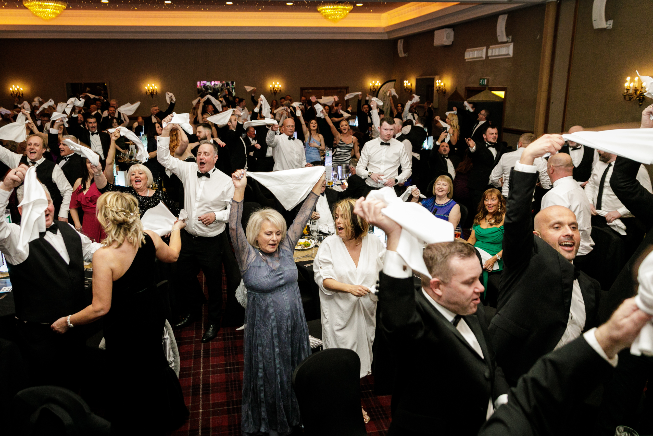 swinging napkins singing waiters