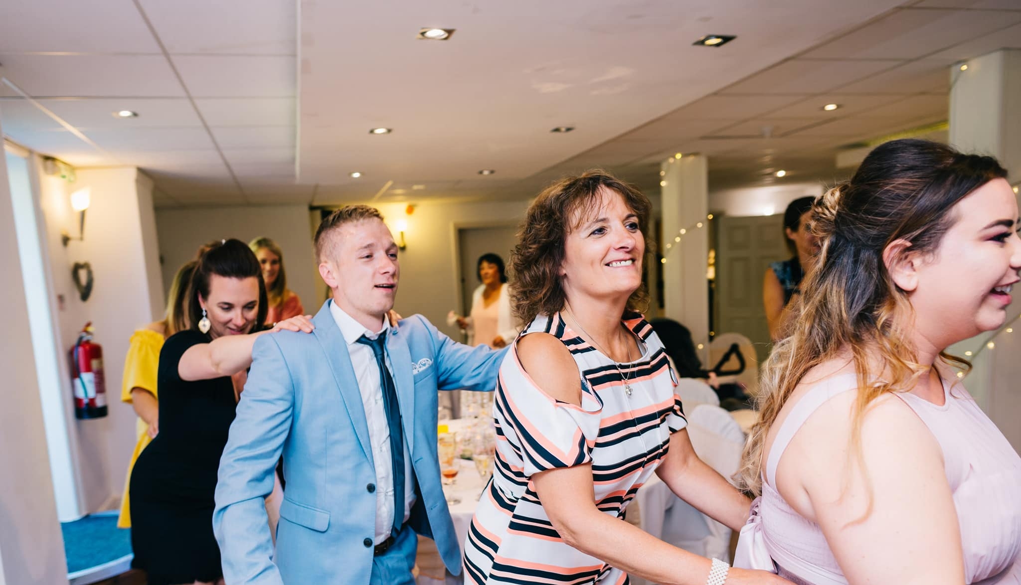 conga line singing waiters