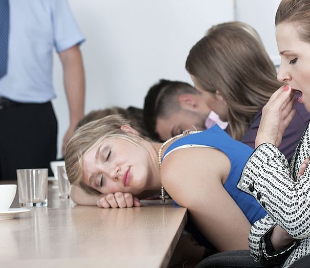 Attendees asleep at a corporate event