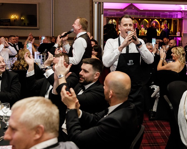 Silver Service Singing Waiters performing at a corporate event
