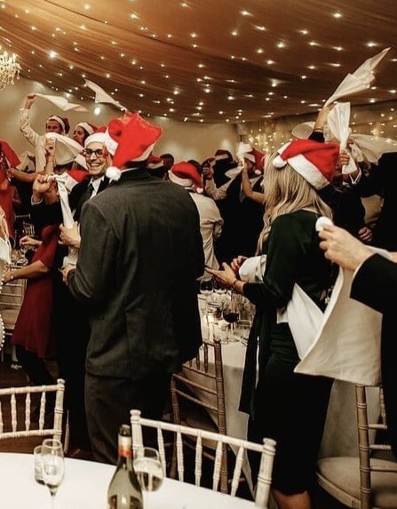 Singing Waiters performing at a Christmas Party